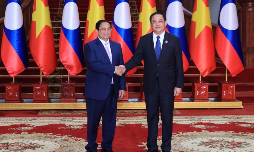 Thủ tướng Chính phủ Phạm Minh Chính và Thủ tướng Lào Sonexay Siphandone - Ảnh: VGP