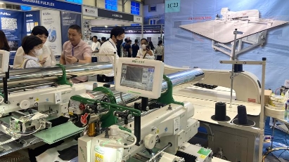 Exhibitions showcasing latest garment and textile technology open in Hanoi