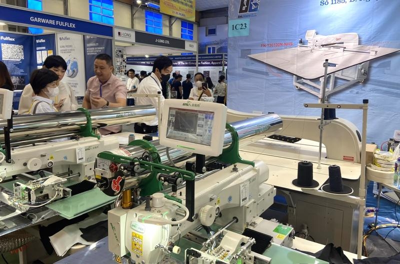 Exhibitions showcasing latest garment and textile technology open in Hanoi