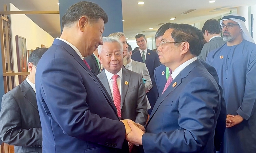 Thủ tướng Chính phủ Phạm Minh Chính gặp Tổng Bí thư, Chủ tịch Trung Quốc Tập Cận Bình. Ảnh: VGP.