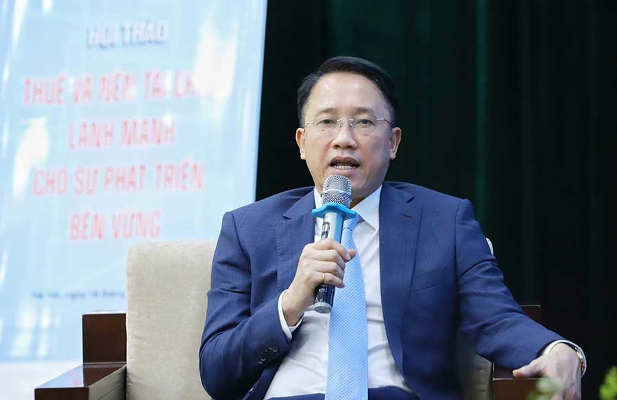Ông Mai Sơn, Phó Tổng cục trưởng, Tổng cục Thuế chia sẻ tại hội thảo (Ảnh: Tô Thế)