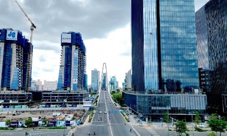 Việc xây dựng Trung tâm tài chính khu vực và quốc tế tại Việt Nam có ý nghĩa, vai trò hết sức quan trọng, là một trong những quyết sách chính trị lớn để chuẩn bị cho kỷ nguyên mới, kỷ nguyên vươn mình của dân tộc. Ảnh minh họa.