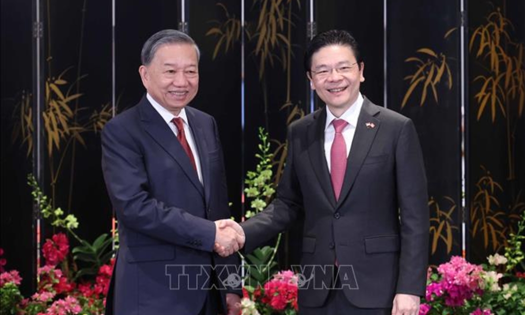 Tổng Bí thư Tô Lâm và Thủ tướng Singapore Lawrence Wong - Ảnh: TTXVN