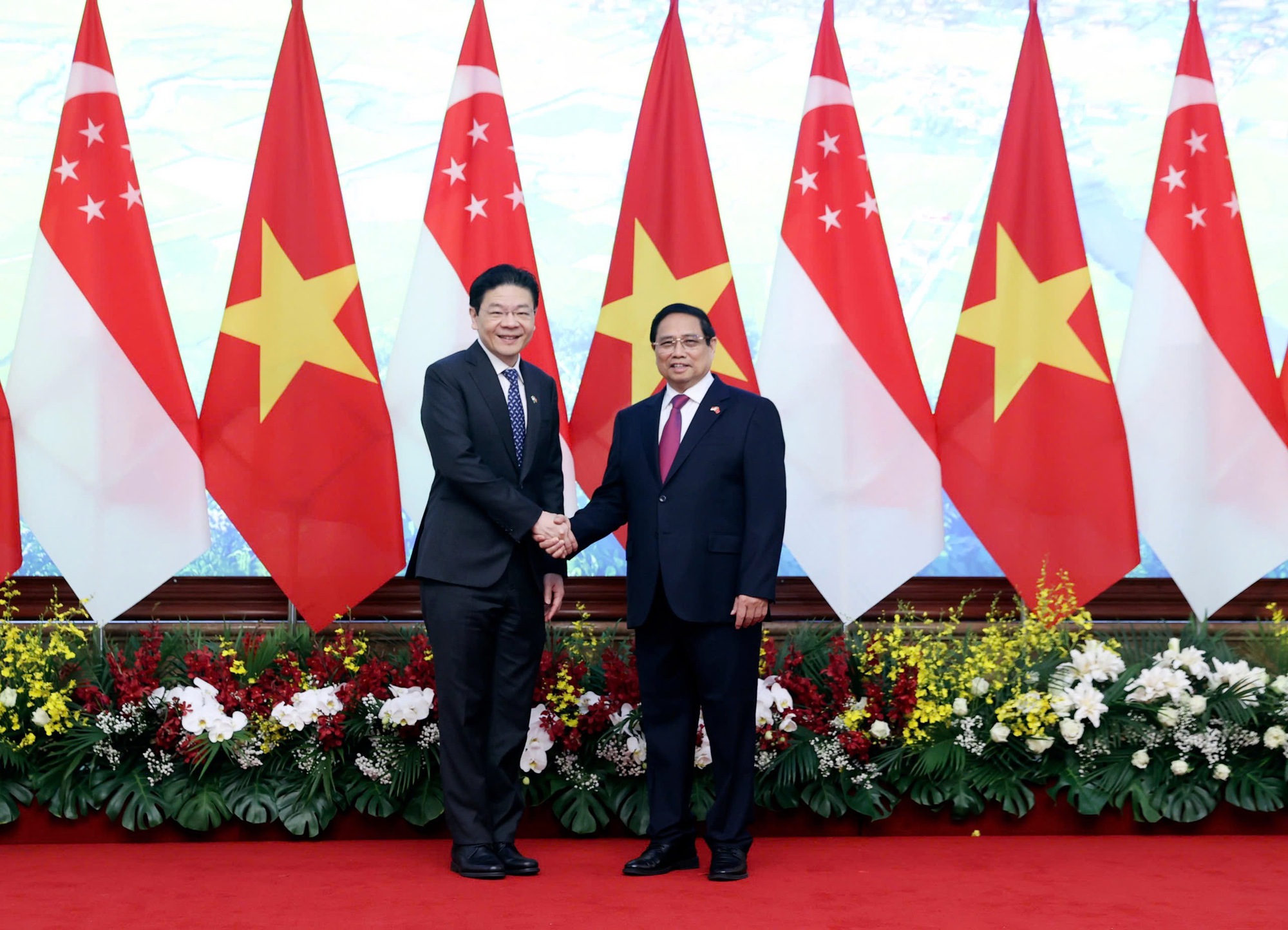 Thủ tướng Phạm Minh Ch&iacute;nh v&agrave; Thủ tướng Singapore Lawrence Wong - Ảnh: VGP