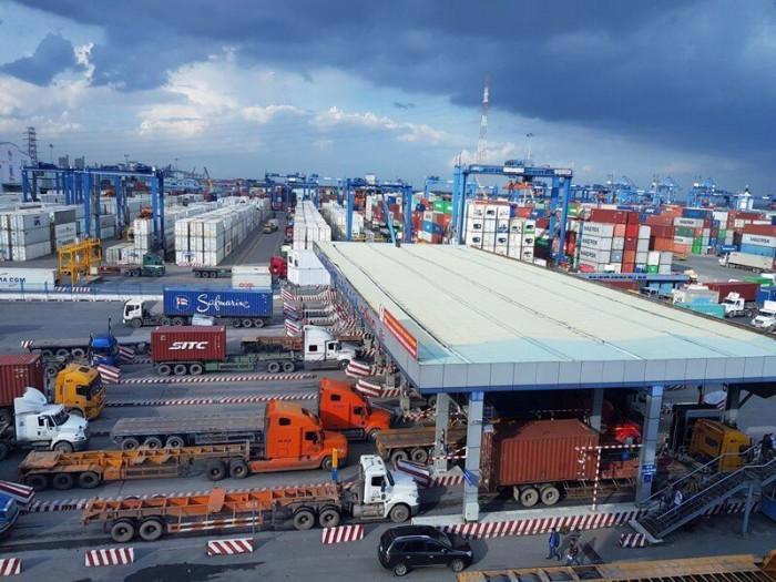 Container trucks entering Cat Lai port. 