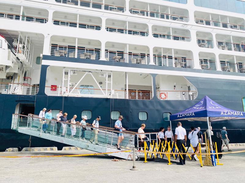 Foreign tourists arrive at a seaport in Vietnam.