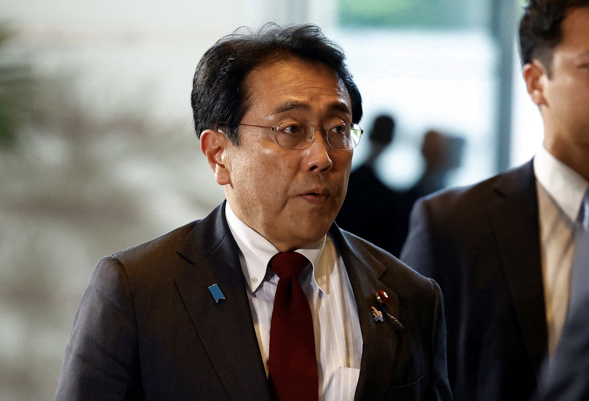 Bộ trưởng Bộ Phục hồi kinh tế Nhật Bản Ryosei Akazawa, trưởng đoàn đàm phán thương mại của Nhật Bản - Ảnh: Reuters.