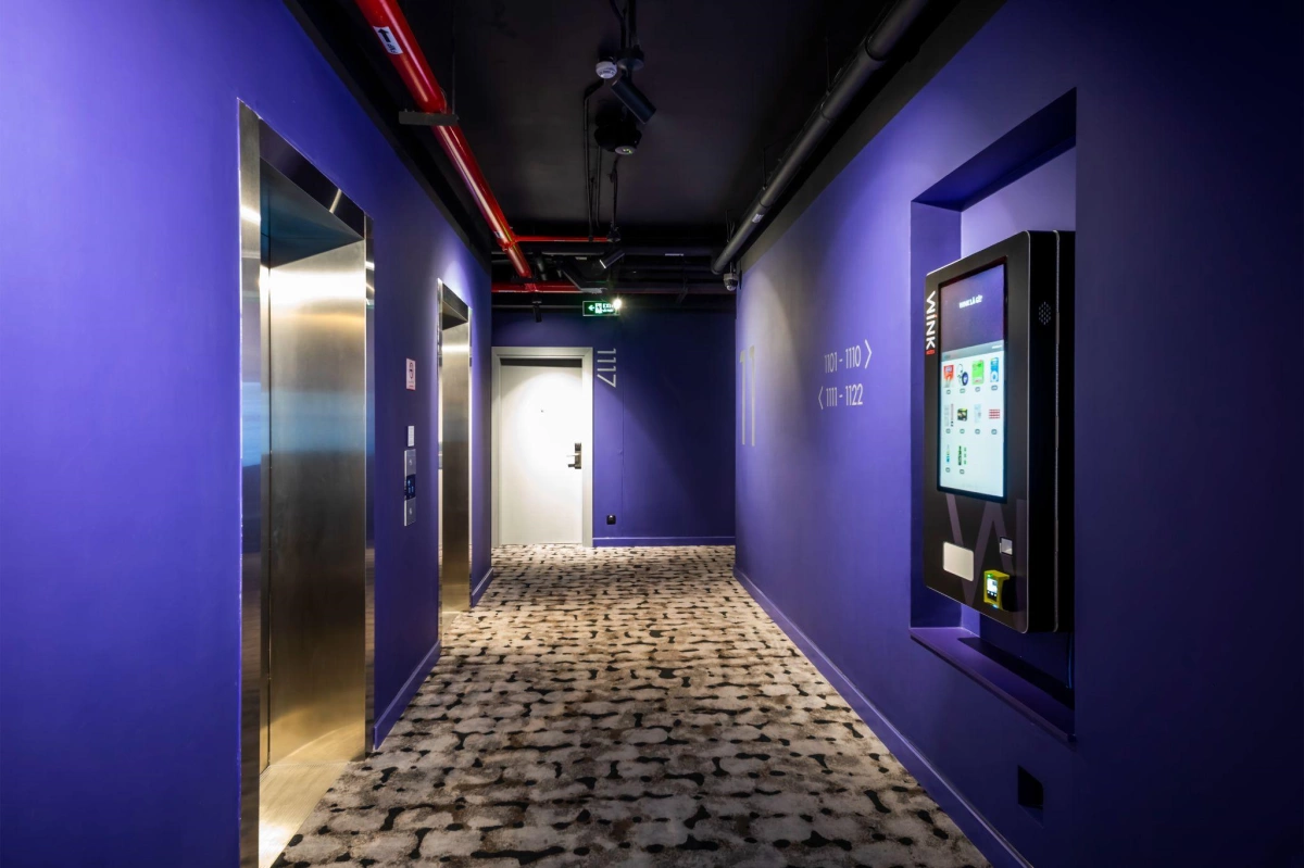 C&aacute;c kh&aacute;ch sạn c&oacute; m&aacute;y b&aacute;n h&agrave;ng tự động, m&aacute;y check-in tự động.&nbsp;Ảnh:&nbsp;Wink Hotels