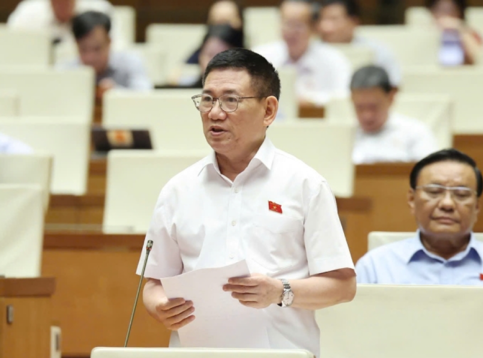 Phó Thủ tướng Hồ Đức Phớc trình bày trước Quốc hội chiều 19/6/2025.