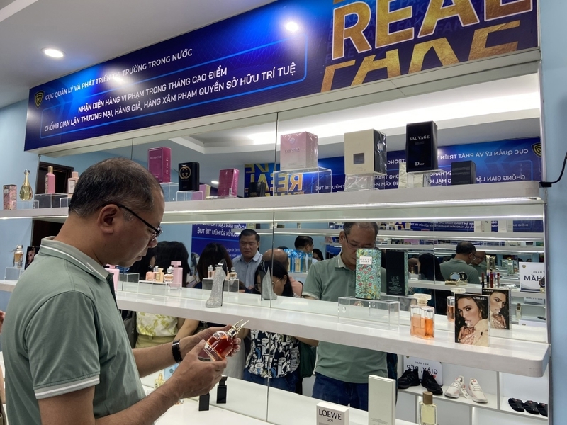 Vietnam puts fake luxury goods on public display