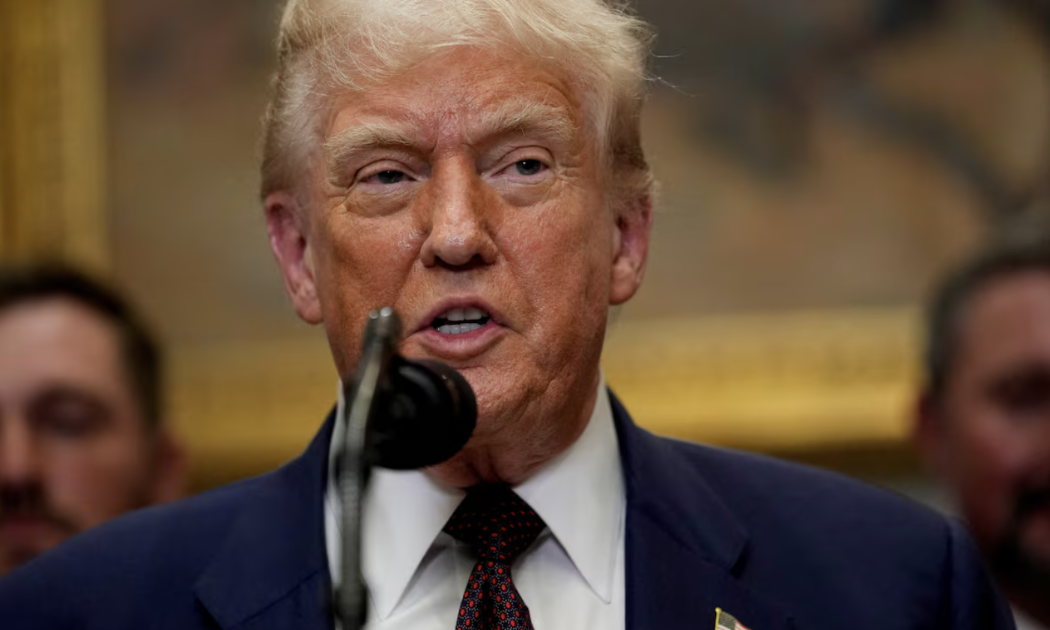 Tổng thống Mỹ Donald Trump phát biểu tại phòng Roosevelt ở Nhà Trắng hôm 31/7 khi công bố thuế suất mới của thuế quan đối ứng - Ảnh: Reuters.