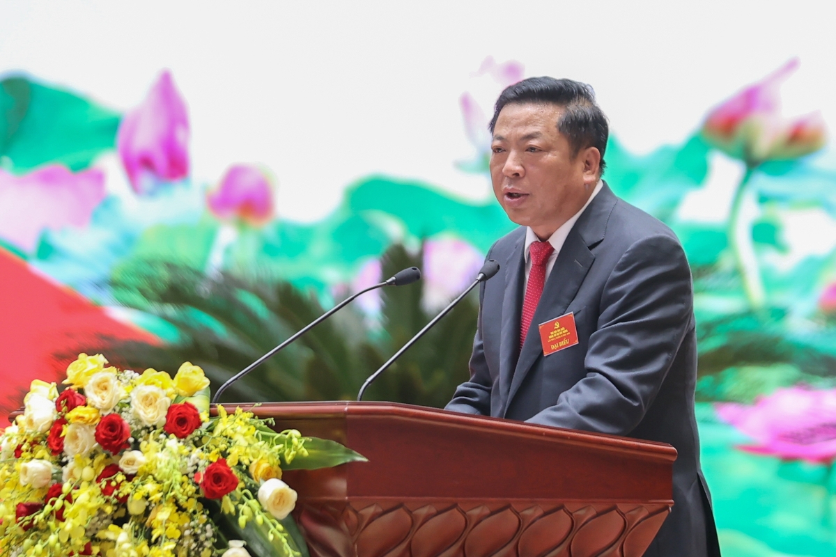 Bộ trưởng Bộ X&acirc;y dựng Trần Hồng Minh b&aacute;o c&aacute;o tại Đại hội - Ảnh: VGP/Nhật Bắc.