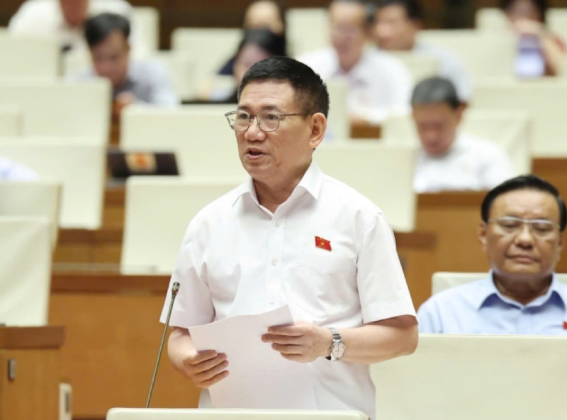 Phó Thủ tướng Hồ Đức Phớc trình bày trước Quốc hội chiều 19/6/2025.