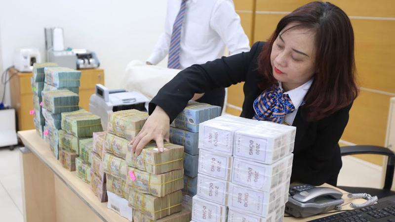 2018 đang bắt đầu gợi mở những con số lợi nhuận rất lớn của hệ thống ngân hàng Việt Nam, những quy mô chưa từng đạt được trong lịch sử - Ảnh: Quang Phúc.