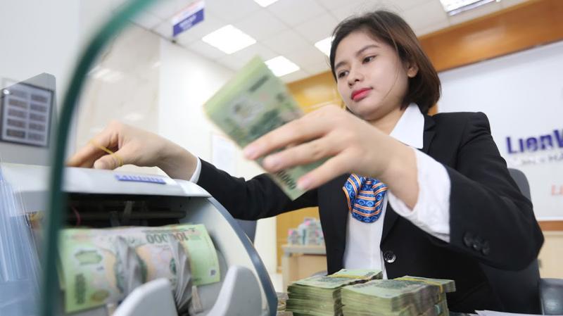 Hỗ trợ cho kế hoạch chào sàn, các ngân hàng nói chung đang khởi đầu 2018 với tăng trưởng lợi nhuận tốt hơn nhiều năm qua - Ảnh: Quang Phúc.