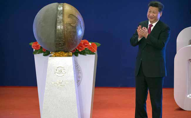 Chủ tịch Trung Quốc Tập Cận Bình tại lễ khai trương AIIB sáng 16/1 - Ảnh: Reuters.<br>