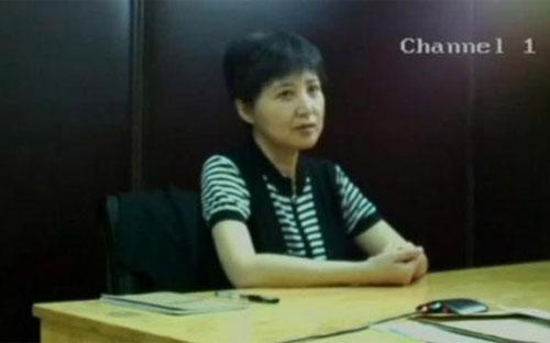 Hình ảnh Cốc Khai Lai xuất hiện trong một đoạn băng video phát tại phiên tòa xét xử Bạc Hy Lai hồi năm 2013 - Ảnh: Reuters.<br>