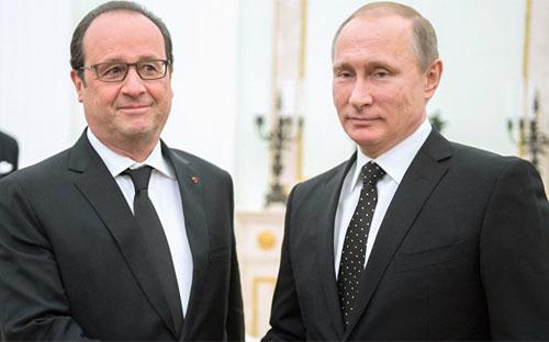 Tổng thống Pháp Francois Holland (trái) và Tổng thống Nga Vladimir Putin trong cuộc gặp tại điện Kremlin ngày 26/11 - Ảnh: Sputnik News.<br>