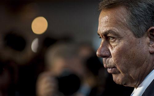 Chủ tịch Hạ viện Mỹ, ông John Boehner, người thuộc phe Cộng hòa, phát biểu trước báo giới ở Capitol Hill hôm 15/10 - Ảnh: Bloomberg.<br>