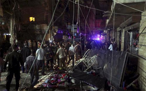 Hiện trường vụ đánh bom ở Beirut, Lebanon ngày 12/11 - Ảnh: Reuters.<br>