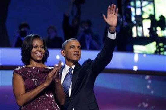 Tổng thống Mỹ Barack Obama và phu nhân Michelle ngày 6/9 - Ảnh: Reuters.