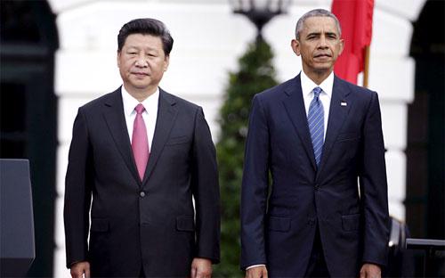 Chủ tịch Trung Quốc Tập Cận Bình (trái) và Tổng thống Mỹ Barack Obama trong chuyến thăm Mỹ vào tháng 9/2015 của ông Tập - Ảnh: Reuters.<br>