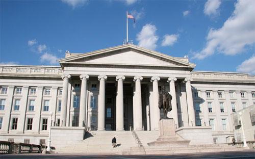 Trụ sở Bộ Tài chính Mỹ ở Washington. Bộ Tài chính Mỹ sẽ sử dụng tiền thuế thu được để đảm bảo khả năng thanh toán tiền lãi suất phát sinh từ nợ quốc gia của nước này.