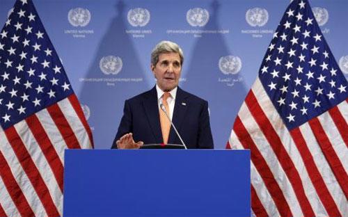 Ngoại trưởng Mỹ John Kerry tuyên bố dỡ bỏ lệnh trừng phạt đối với Iran, tại Vienna, Áo, ngày 16/1 - Ảnh: Reuters.<br>