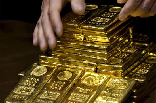 Việc một hầm vàng lớn được xây dựng ở Hồng Kông phản ánh nhu cầu vàng gia tăng ở châu Á, bất chấp thực tế giá vàng thế giới từ đầu năm tới nay khá chật vật trong việc thiết lập năm tăng thứ 12 liên tục - Ảnh: AP.