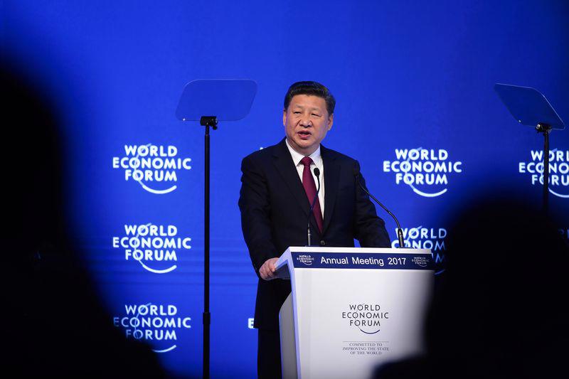 Chủ tịch Trung Quốc Tập Cận Bình phát biểu tại Diễn đàn Kinh tế Thế giới (WEF), Davos, Thụy Sỹ ngày 17/1 - Ảnh: Bloomberg.<br>