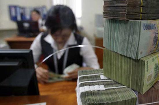 “Cho đến thời điểm này, có thể nói phương án tăng vốn điều lệ của các tổ chức tín dụng cổ phần ở Hà Nội đều có tính khả thi và đảm bảo theo quy định của Nghị định 141”, bản tin từ Ngân hàng Nhà nước cho biết - Ảnh: Reuters.