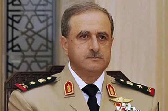 ng Rajha là Bộ trưởng Bộ Quốc phòng kiêm Phó chủ tịch Hội đồng Bộ trưởng Syria - Ảnh: Reuters.