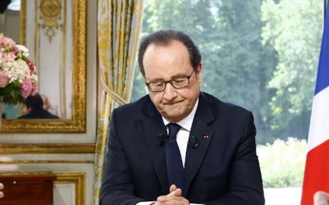 Cảm xúc của Tổng thống Pháp Francois Hollande trước bài phát biểu về vụ tấn công tại Nice - Ảnh: Reuters.<br>