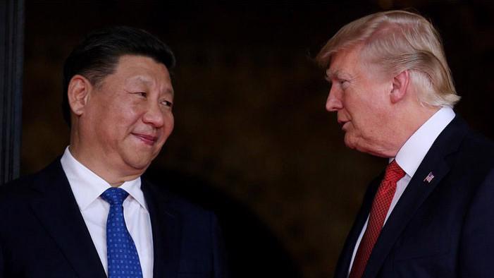 Chủ tịch Trung Quốc Tập Cận Bình (trái) và Tổng thống Mỹ Donald Trump trong cuộc gặp ở Florida, Mỹ, tháng 4/2017 - Ảnh: Reuters.