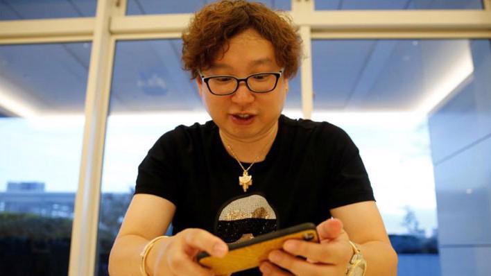 Yoshinori Kobayashi, 39 tuổi, từng là một nhà giao dịch cổ phiếu và đã chuyển sang giao dịch Bitcoin từ hai năm rưỡi trước - Ảnh: Reuters.