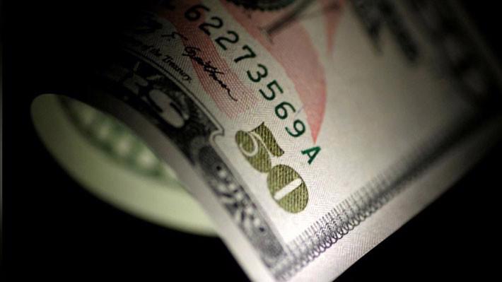 Đồng USD đang bị đầu cơ giá xuống - Ảnh: Reuters.