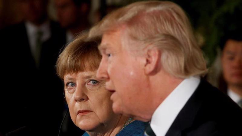 Thủ tướng Đức Angela Merkel (trái) và Tổng thống Mỹ Donald Trump trong một cuộc gặp - Ảnh: Reuters/Newsweek.