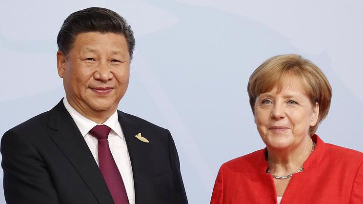 Chủ tịch Trung Quốc Tập Cận Bình (trái) và Thủ tướng Đức Angela Merkel.