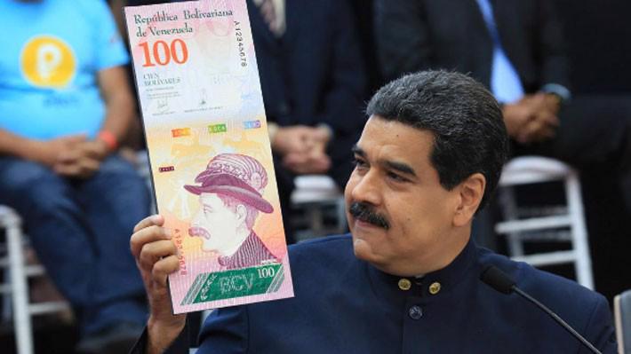 Tổng thống Nicolas Maduro của Venezuela trong một cuộc họp với các quan chức kinh tế nước này ở Caracas ngày 22/3 - Ảnh: Reuters.