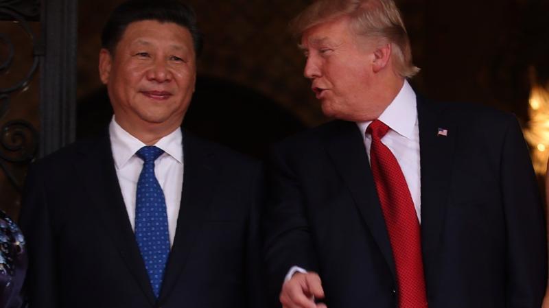 Chủ tịch Trung Quốc Tập Cận Bình (trái) và Tổng thống Mỹ Donald Trump - Ảnh: Reuters.