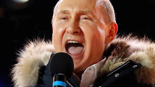 Tổng thống Nga Vladimir Putin ăn mừng chiến thắng tái đắc cử ở Moscow hôm 18/3 - Ảnh: Reuters.