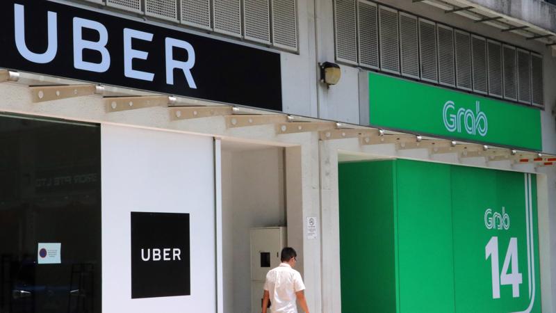 Hồi tháng 3, Uber bán lại hoạt động tại thị trường Đông Nam Á cho đối thủ Grab - Ảnh: Nikkei.
