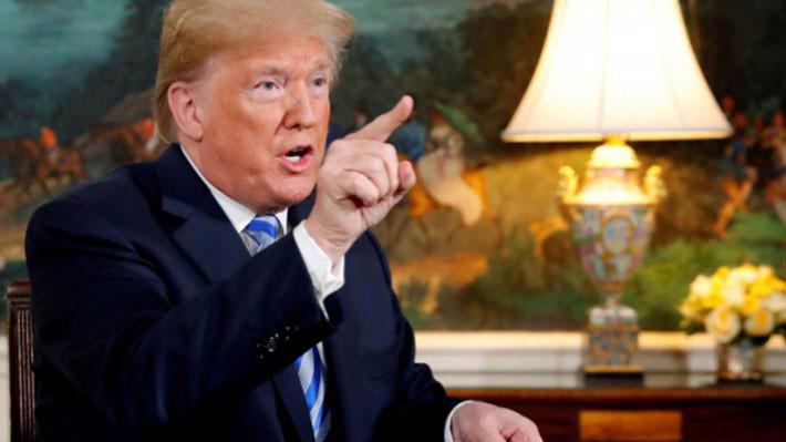 Tổng thống Mỹ Donald Trump tuyên bố rút khỏi thỏa thuận hạt nhân Iran hồi tháng 5/2018 - Ảnh: Reuters.