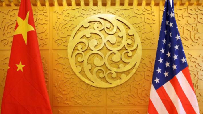 Một số chuyên gia cho rằng sẽ không gì có thể ngăn đà leo thang của cuộc chiến thương mại Mỹ-Trung, bởi hai bên đều cương quyết giữ lập trường cứng rắn của mình - Ảnh: Reuters.