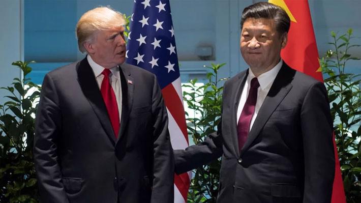 Tổng thống Mỹ Donald Trump (trái) và Chủ tịch Trung Quốc Tập Cận Bình tại cuộc gặp bên lề thượng đỉnh G20, tháng 7/2017 - Ảnh: Reuters.