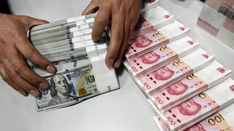 Phá giá Nhân dân tệ đi kèm nhiều rủi ro đối với kinh tế Trung Quốc - Ảnh: Reuters.