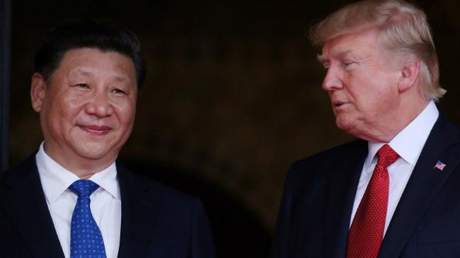 Chủ tịch Trung Quốc Tập Cận Bình (trái) và Tổng thống Donald Trump - Ảnh: Reuters.