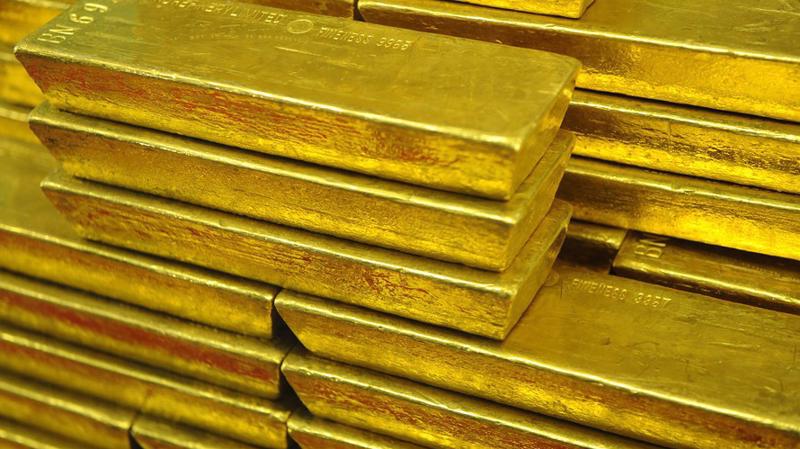 Giá vàng thế giới đang chịu sức ép giảm từ đồng USD mạnh lên - Ảnh: Getty/MarketWatch.