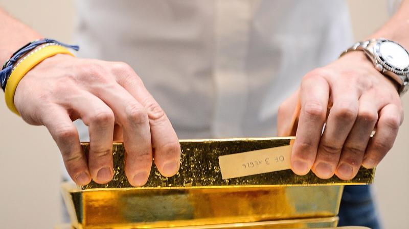Tuần trước, giá vàng thế giới biến động khá mạnh theo biến động tỷ giá đồng USD - Ảnh: Getty/CNBC.