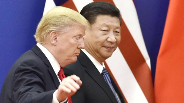 Tổng thống Mỹ Donald Trump (trái) và Chủ tịch Trung Quốc Tập Cận Bình - Ảnh: Kyodo/SCMP.